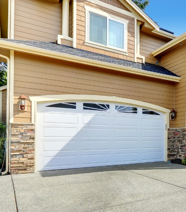 house with nice large white garage door