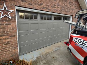 Retro fit garage door installation in the 16x7 model 68 in the color glazed bronze.