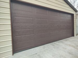 Residential Garage Installation of 20x8 Model and 67 ranch panels in the color brown by All American Garage Doors