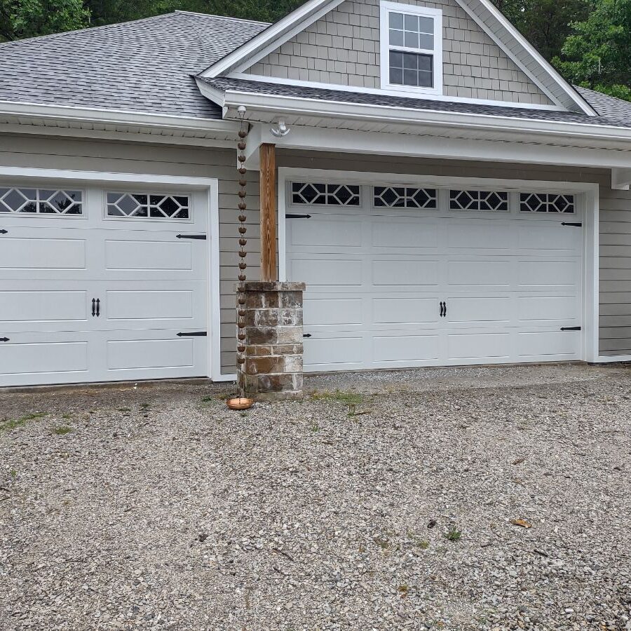 Residential Garage Door Installation of 9x7 model 65 gloss black retro fit by All American Garage Doors
